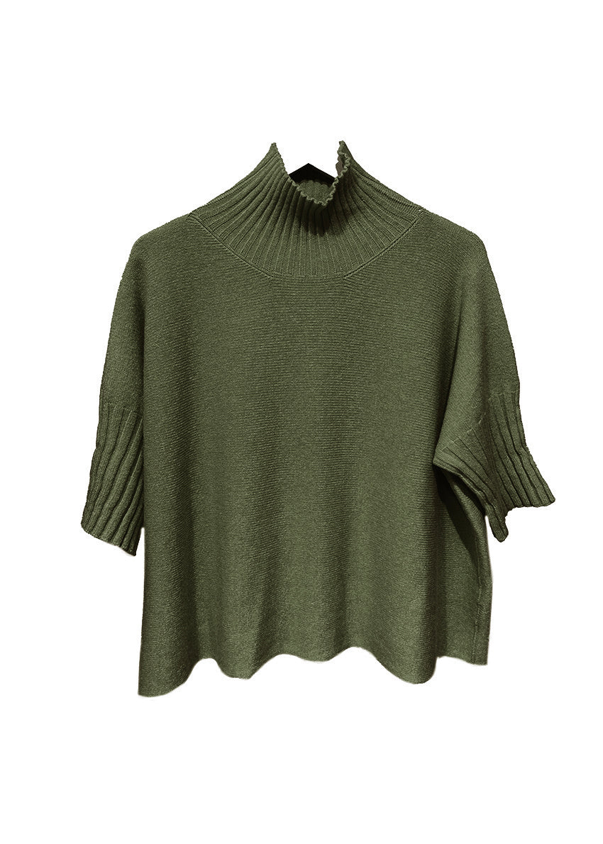 A very simple dark olive green sweater with ribbed sleeves texture and turtle neck, the vertical ribs makes it classy and comfortable. Very easy to wear, medium length, this sweater is for intermediate spring/ autumn days.
