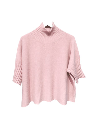 A very simple rose sweater with ribbed sleeves texture and turtle neck, the vertical ribs makes it classy and comfortable. Very easy to wear, medium length, this sweater is for intermediate spring/ autumn days.