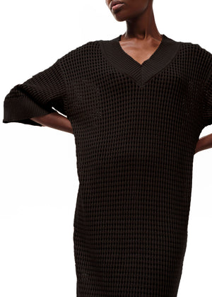 Midi dress with a perforated knitting stitch made of high quality Greek cotton in a loose fit.