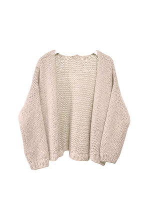 Beige knitted cardigan on a white background