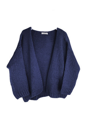 Blue knitted cardigan on a white background