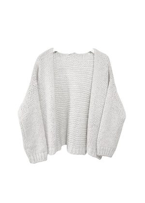 White knit cardigan on a white background