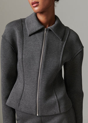 Gray jacket with a zipper on a neutral background