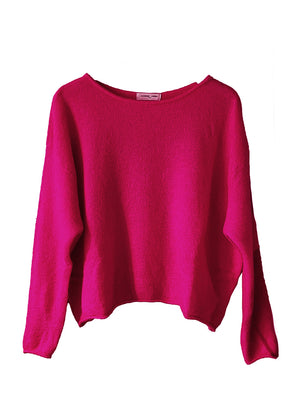 Pink sweater on a white background