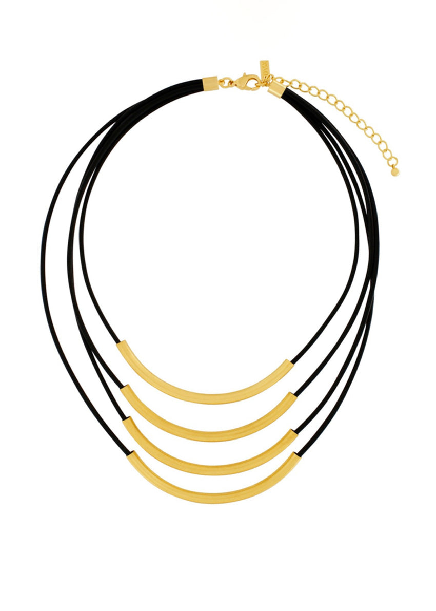 A multi-string leather necklace with gold and silver plating, featuring a brass foundation. The necklace has a combination of black and white leather strings and metal bars.