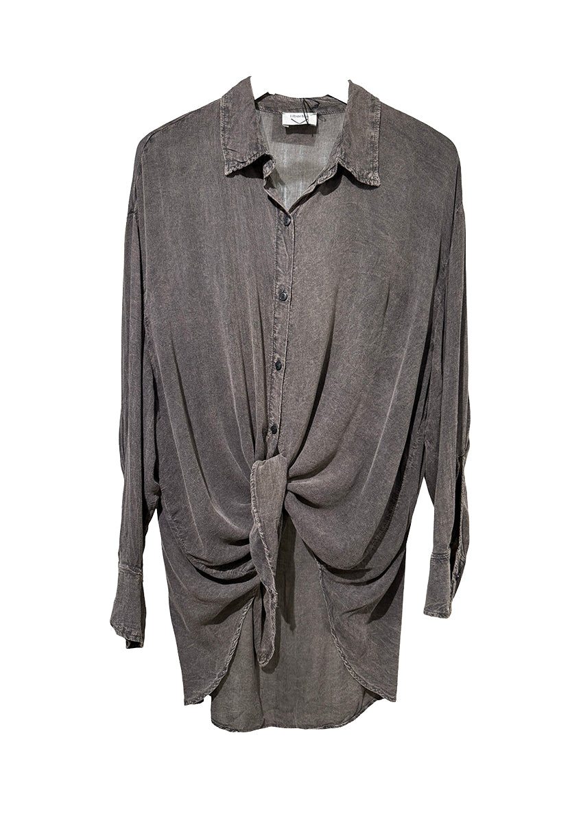 Gray draped shirt on a white background