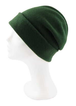 A dark green wool beanie on a white background 