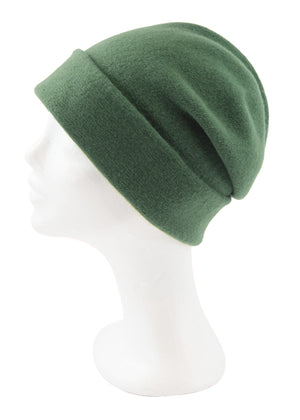 A dark sea green wool beanie on a white background 