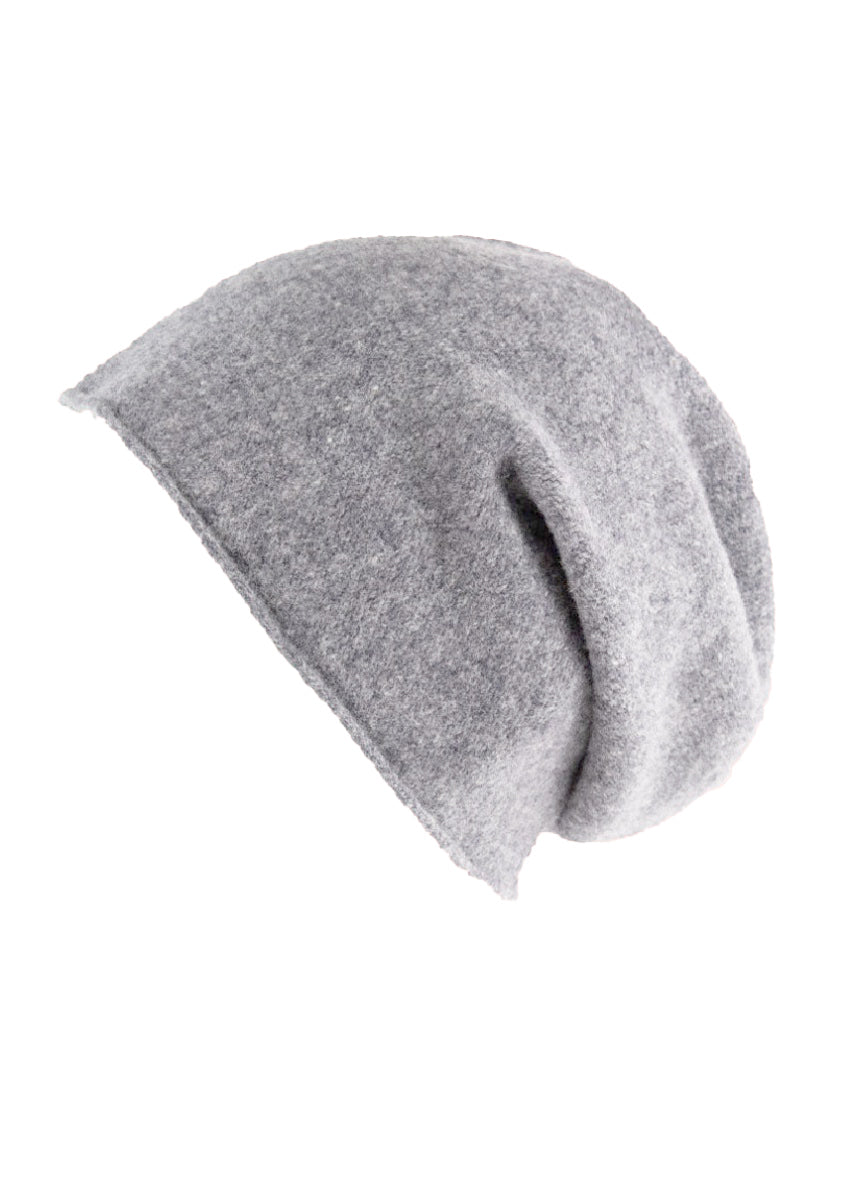 A grey wool beanie on a white background 