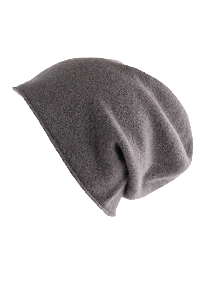 A grey wool beanie on a white background 