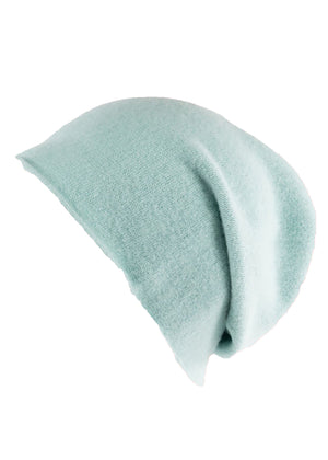 A mint wool beanie on a white background 