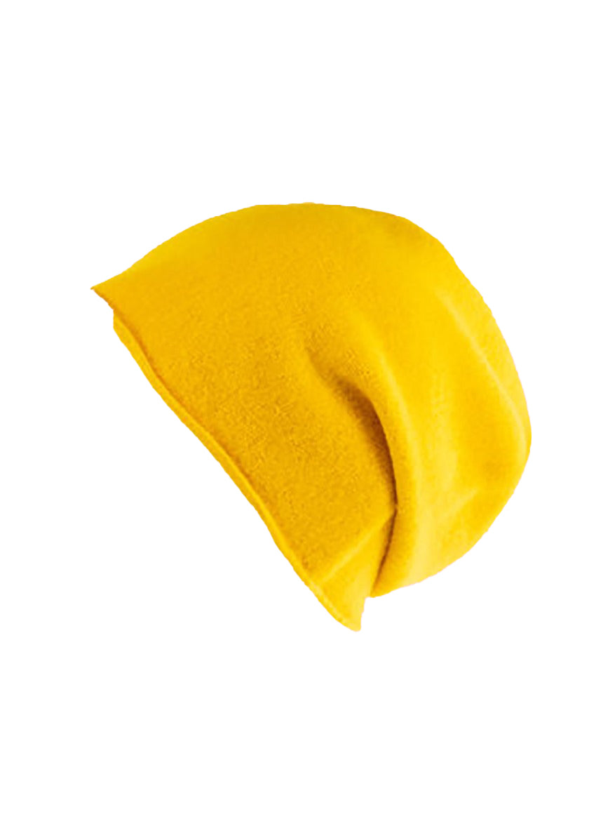 A yellow wool beanie on a white background 