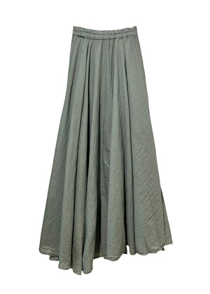 Long green skirt on a white background