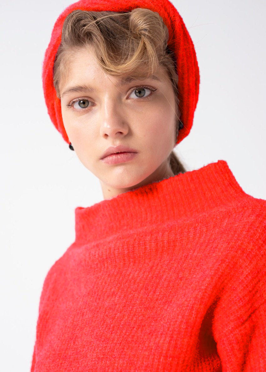 A gray sweater with a boat neckline and raglan sleeves, displayed against a plain background.