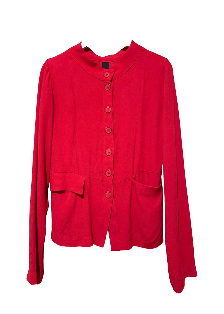 Person wearing a red outfit with a white background