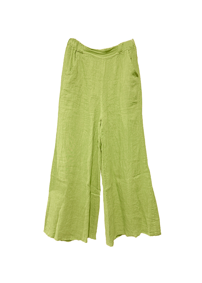Green linen pants on a white background
