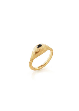 Gold ring with a black gemstone on a white background