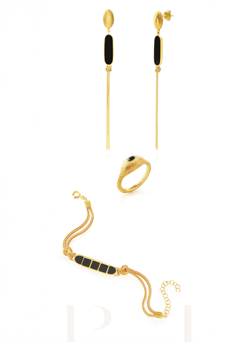 Gold jewelry set with earrings, ring, and bracelet on a white background