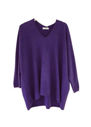 Purple sweater on a white background