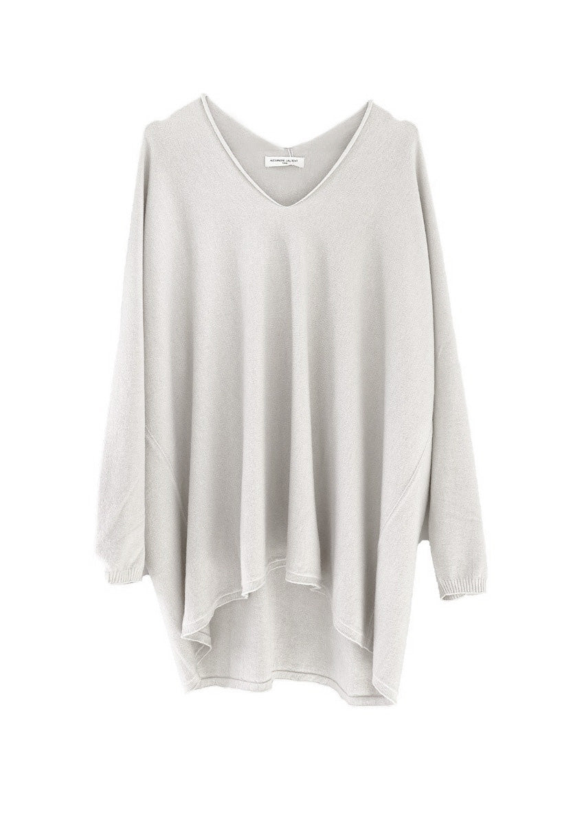 A ivory sweater on a white background 