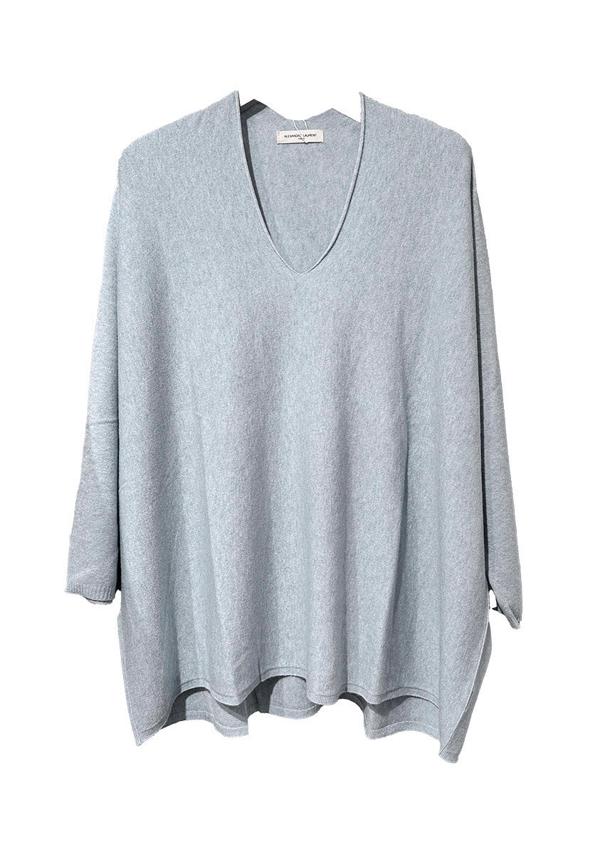 A light steel blue sweater on a white background 