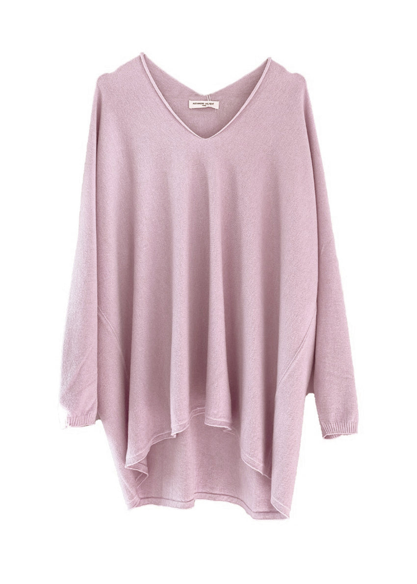 Pink sweater on a white background