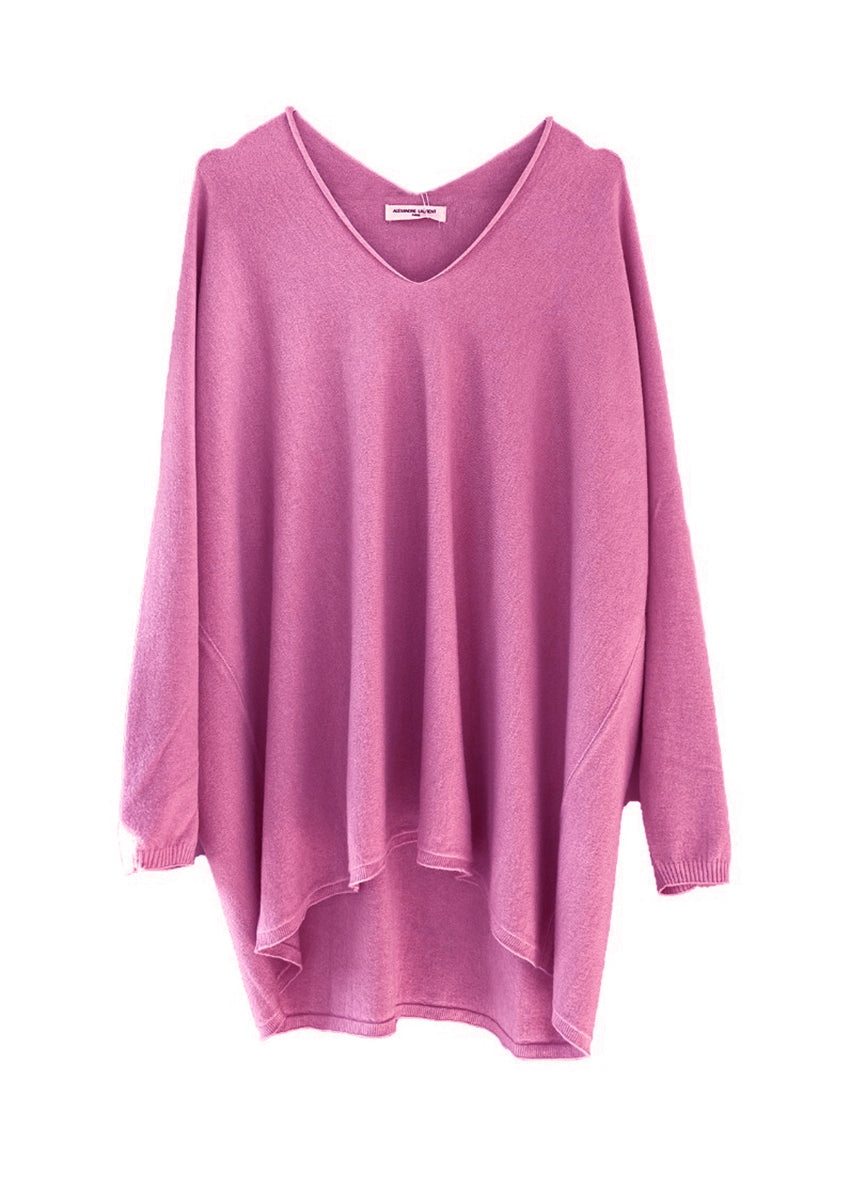 A pale violet red sweater on a white background 