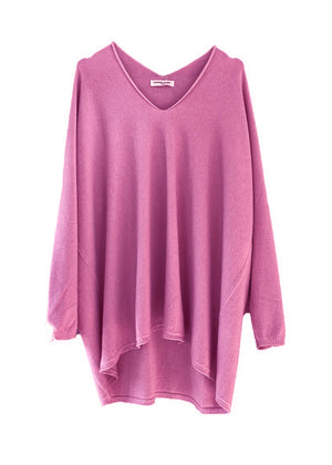 A pale violet red sweater on a white background 