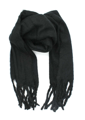 Envelop yourself in a cocoon of comfort with this exquisite black scarf. Its luxuriously soft texture provides a comforting touch. Enhancing the design, the scarf features medium-sized fringes create a subtle movement
