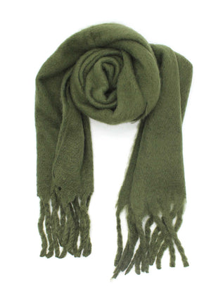 Envelop yourself in a cocoon of comfort with this exquisite dark olive green scarf. Its luxuriously soft texture provides a comforting touch. Enhancing the design, the scarf features medium-sized fringes create a subtle movement