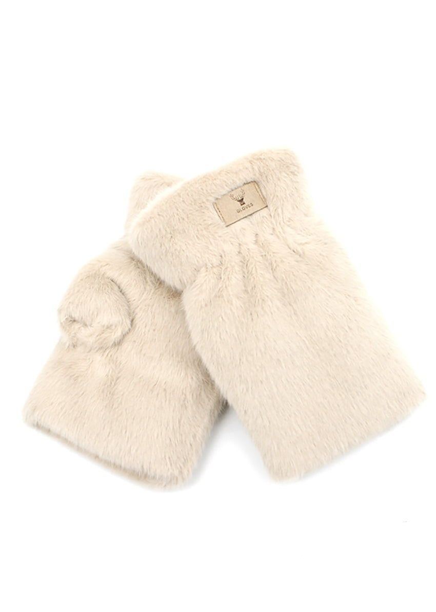 Pair of cream-colored faux fur mittens on a white background