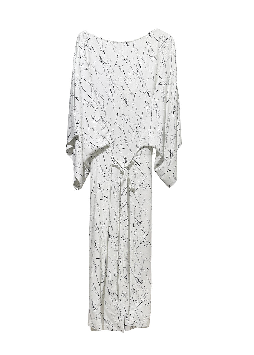 White dress with black abstract pattern on a white background