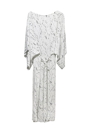 White dress with black abstract pattern on a white background