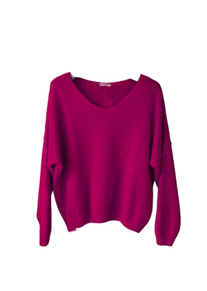 A dark magenta, loose-fitting, long-sleeved sweater with a deep V neckline.