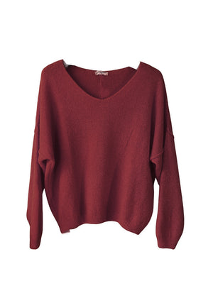 Maroon sweater on a white background