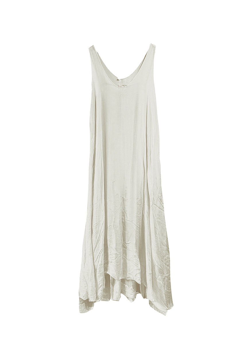 Long and lejere cornsilk dress, with 2 layers, made of silk and viscose, features a deep V neckline both for front and back and fabric waves on the lower part. Amazing piece for this summer!