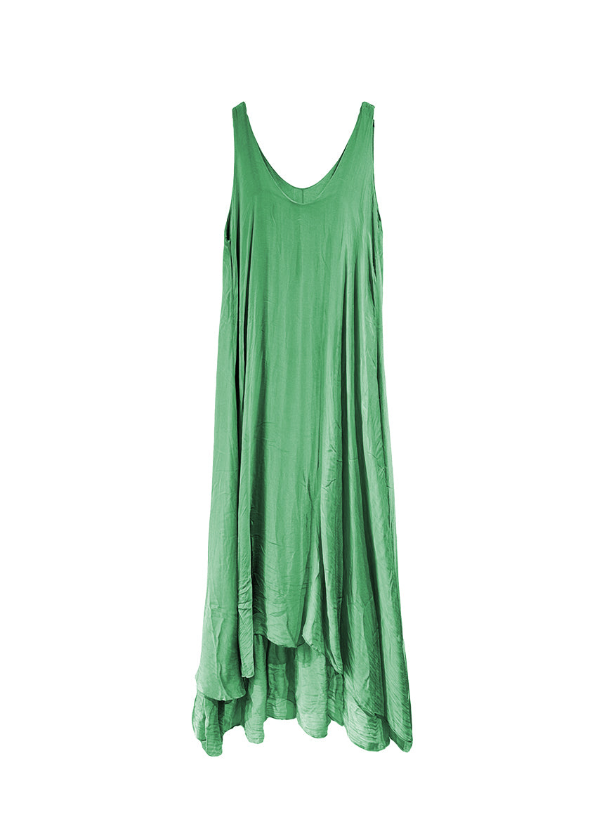 Long and lejere forest green dress, with 2 layers, made of silk and viscose, features a deep V neckline both for front and back and fabric waves on the lower part. Amazing piece for this summer!