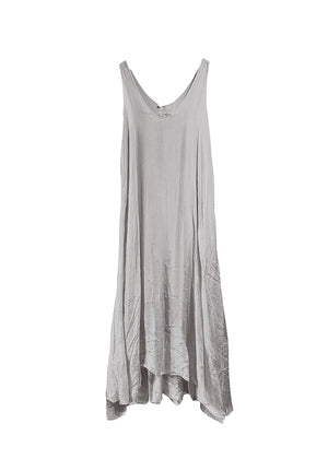 Long and lejere wheat dress, with 2 layers, made of silk and viscose, features a deep V neckline both for front and back and fabric waves on the lower part. Amazing piece for this summer!