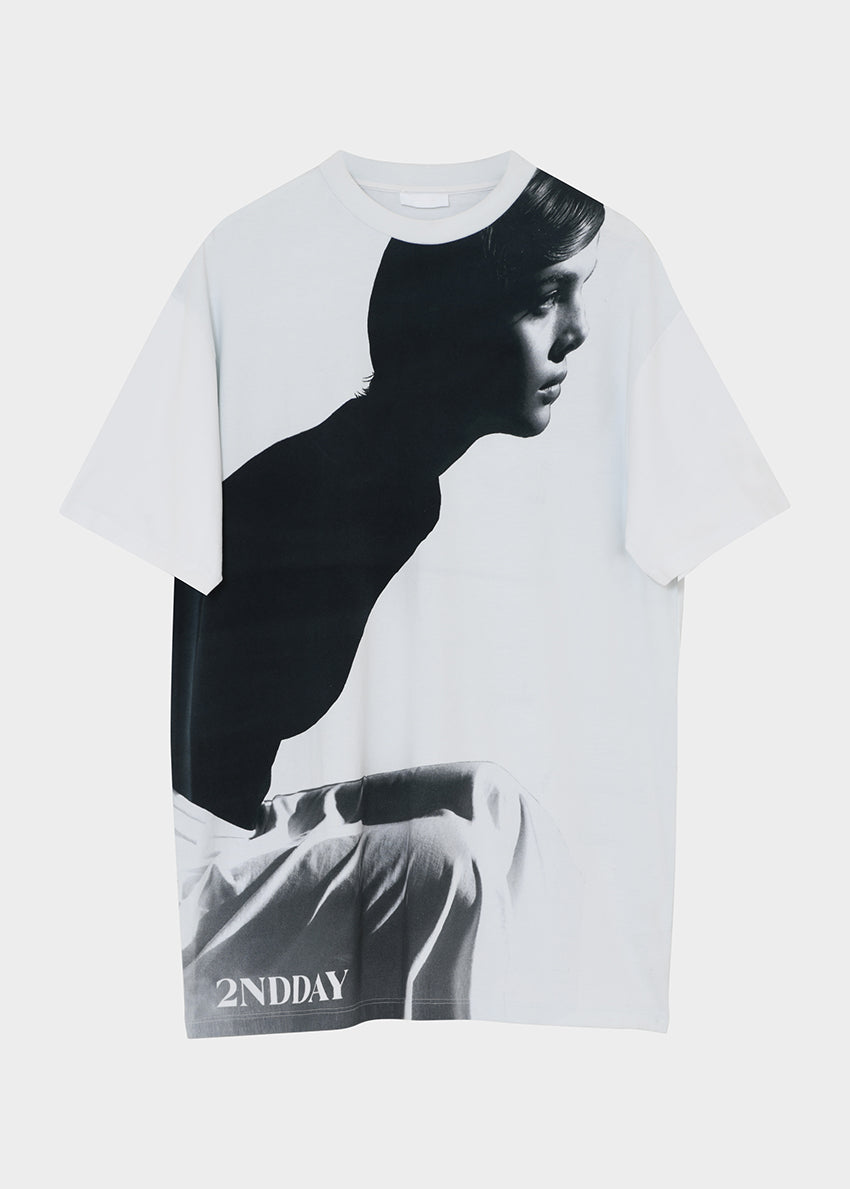 White t-shirt with black and white graphic of a person and '2NDAY' branding on a white background