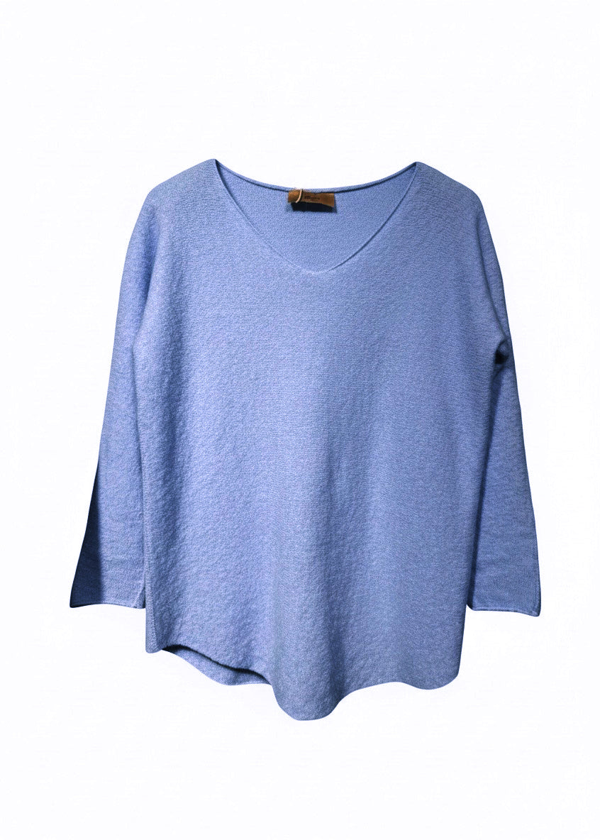 Blue sweater on a white background