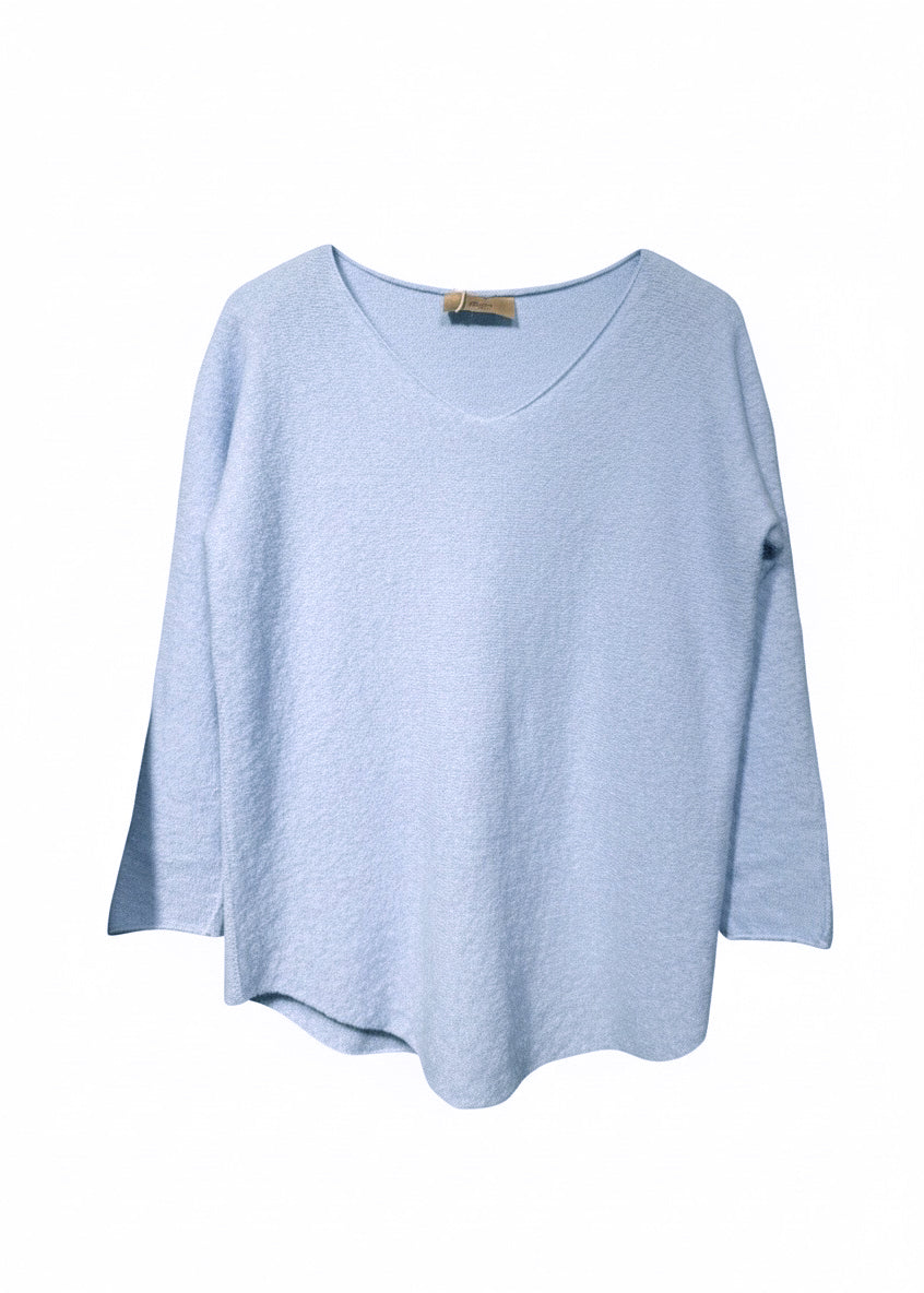 Blue sweater on a white background