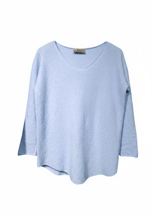 Blue sweater on a white background