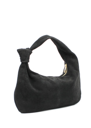 This is a stylish and contemporary hobo black bag crafted from soft suede leather . Its slouchy, relaxed silhouette makes it an effortless choice for casual outings, while the luxurious suede adds a touch of sophistication. The bag features a single, wide handle with a chic knot detail, allowing it to sit comfortably on your shoulder.
