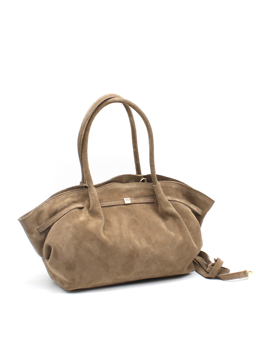 Brown suede handbag on a white background