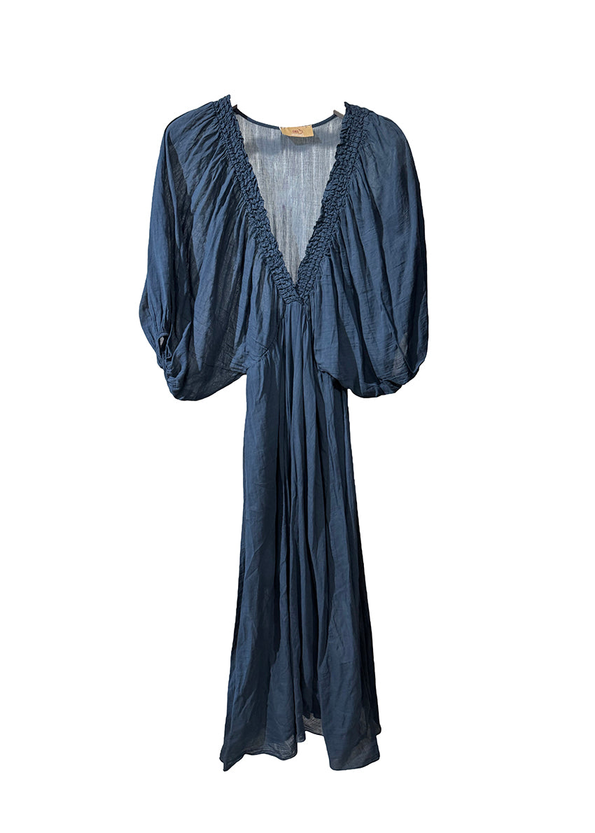 Navy blue dress with a textured overlay on a white background