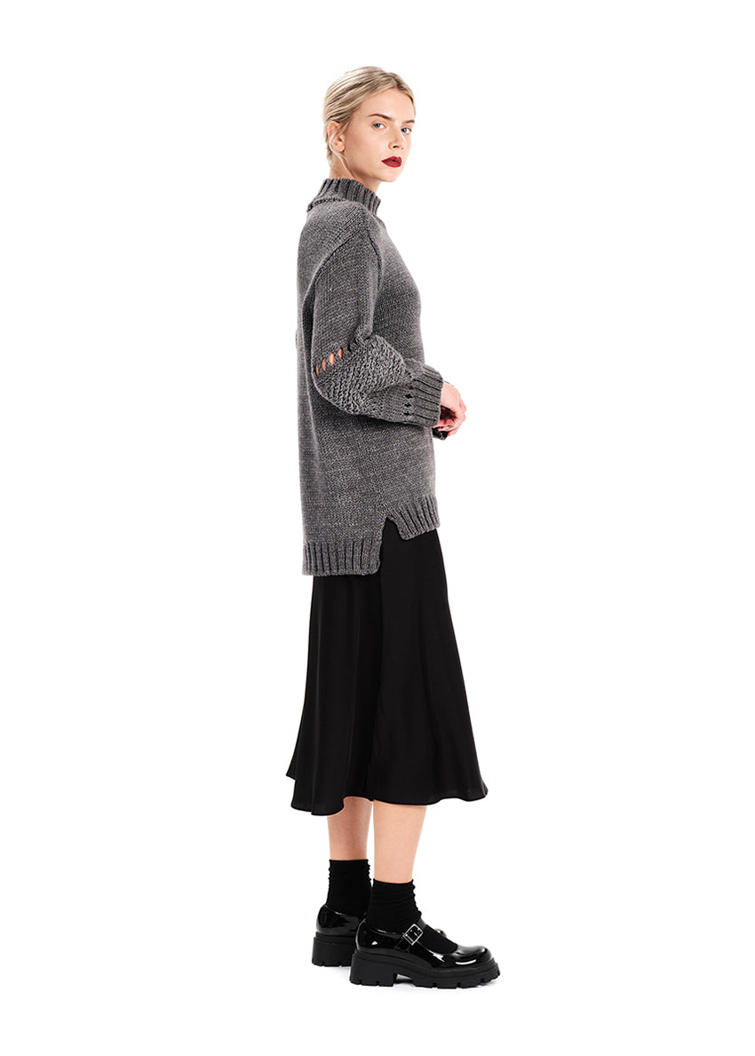 Knit long – sleeved grey top in a loose fit.Knit long – sleeved top in a loose fit made of a blend of two different fabrics.Pair it with pieces from our collection for the ultimate winter outfits.