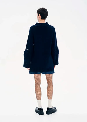 Knit long – sleeved blue top in a loose fit.Knit long – sleeved top in a loose fit made of a blend of two different fabrics.Pair it with pieces from our collection for the ultimate winter outfits.
