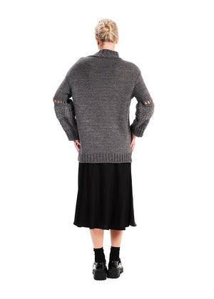 Knit long – sleeved grey top in a loose fit.Knit long – sleeved top in a loose fit made of a blend of two different fabrics.Pair it with pieces from our collection for the ultimate winter outfits.