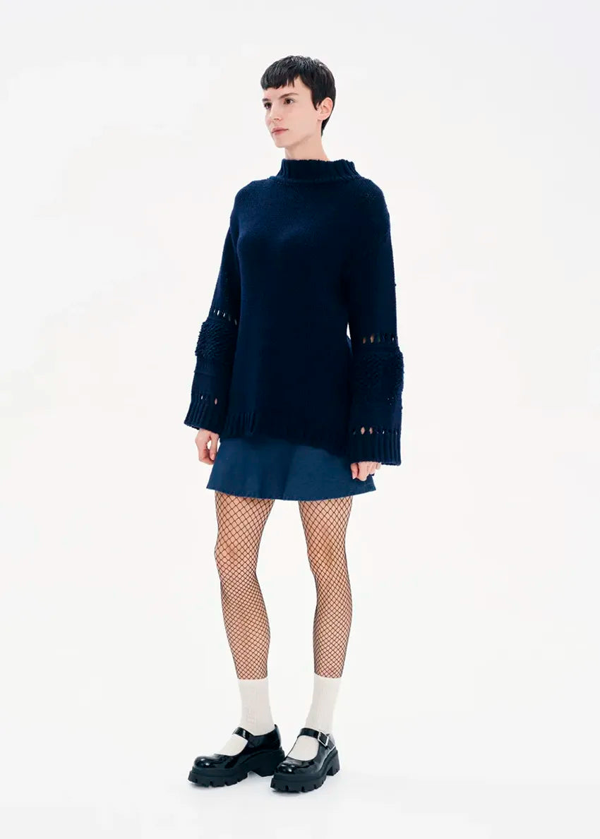 Knit long – sleeved blue top in a loose fit.Knit long – sleeved top in a loose fit made of a blend of two different fabrics.Pair it with pieces from our collection for the ultimate winter outfits.