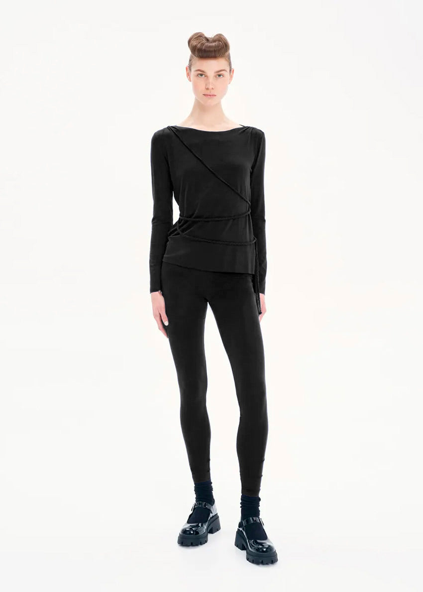 The softest top ever, perfect for layering and daily life usage during colder seasons. It features a design with non – removable strings.